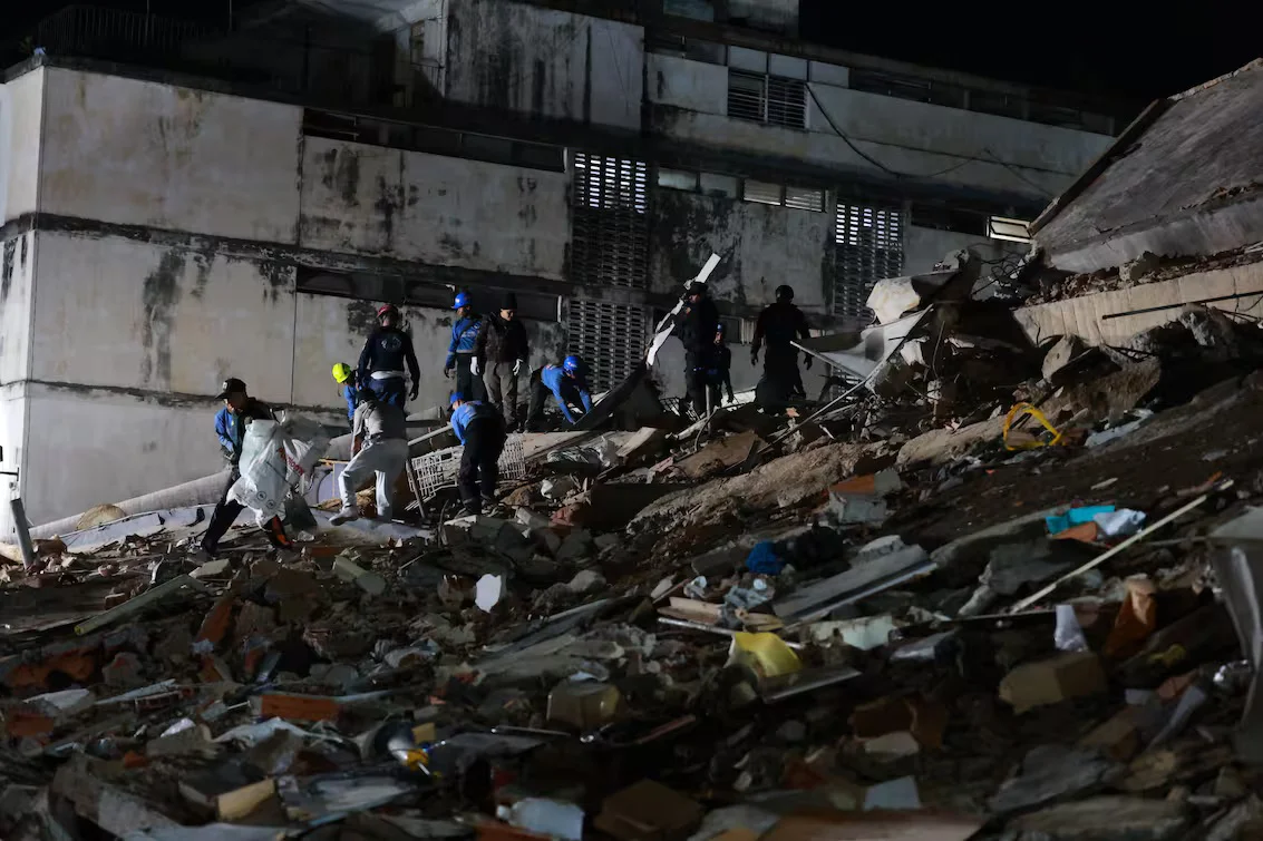 rescue-workers-search-through-the-rubble-of-a-N4PGDNY4CFGHNBFFWBB7BC2I4I
